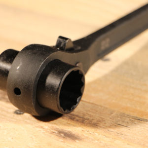 Reversible ratchet wrenches